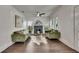 Hardwood flooring, multiple windows, and stylish brick fireplace in living room at 2920 N 11Th St, Tampa, FL 33605
