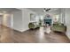 Living room with hardwood flooring, brick fireplace, and modern decor at 2920 N 11Th St, Tampa, FL 33605