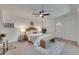 Bright bedroom boasts a comfortable bed, seating, and modern decor at 2920 N 11Th St, Tampa, FL 33605