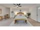 Bright and stylish bedroom with a bed, seating, and modern decor at 2920 N 11Th St, Tampa, FL 33605