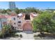 Aerial view of a community with peach-colored townhomes and terracotta tile roofs at 3025 W Grovewood Ct # B, Tampa, FL 33629