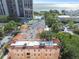 Aerial view of the townhomes near community pool, tennis courts, and the bay at 3025 W Grovewood Ct # B, Tampa, FL 33629