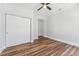 Bright bedroom features a ceiling fan, and a closet for ample storage at 307 S Newport Ave, Tampa, FL 33606