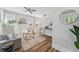 Bright living room with hardwood floors, fireplace, and lots of natural light from large windows at 307 S Newport Ave, Tampa, FL 33606