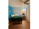 Bedroom with closet and a ceiling fan at 3516 Lake Bayshore Dr # K109, Bradenton, FL 34205