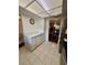 Bright kitchen featuring white cabinets, marble countertops, stainless steel appliances and an open floor plan at 3516 Lake Bayshore Dr # K109, Bradenton, FL 34205