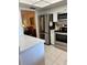 Bright kitchen with stainless steel appliances and white cabinets at 3516 Lake Bayshore Dr # K109, Bradenton, FL 34205