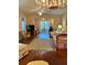 Cozy living room featuring hardwood floors, comfortable seating, and access to the outdoor patio at 3516 Lake Bayshore Dr # K109, Bradenton, FL 34205