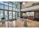 Elegant lobby features large windows, tiled floors, a reception area, and a stylish floral centerpiece at 400 4Th S Ave # 401, St Petersburg, FL 33701