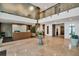 Beautiful lobby with a reception desk, tiled flooring, a floral arrangement, and modern architectural details at 400 4Th S Ave # 401, St Petersburg, FL 33701