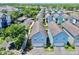 Aerial view showcases the community's well-maintained homes, lush landscaping, and inviting streetscapes at 4002 Carrollwood Palm Ct, Tampa, FL 33624