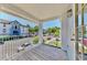 A balcony overlooking the parking area offers outdoor living space for relaxing and enjoying the surrounding views at 4002 Carrollwood Palm Ct, Tampa, FL 33624