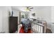 A Bedroom showcases contemporary furnishings, a ceiling fan and stylish decor creating a cozy and inviting atmosphere at 4002 Carrollwood Palm Ct, Tampa, FL 33624