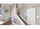 Hallway with staircase and sliding barn door at 4002 Carrollwood Palm Ct, Tampa, FL 33624