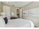 Bright bedroom with simple decor and modern artwork, creating a serene and inviting atmosphere at 4257 Rosatti Rd, Wesley Chapel, FL 33543