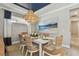 Charming dining area with decor, lighting, and a view of the backyard at 4257 Rosatti Rd, Wesley Chapel, FL 33543