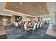 Expansive dining area with modern lighting and stylish decor, ideal for hosting large gatherings and events at 4257 Rosatti Rd, Wesley Chapel, FL 33543