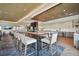Modern lounge area featuring a high-top table, seating, and kitchen area at 4257 Rosatti Rd, Wesley Chapel, FL 33543