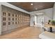 Cozy wine room featuring individual wine storage with wooden floors at 4257 Rosatti Rd, Wesley Chapel, FL 33543