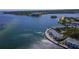 Expansive aerial perspective of waterfront condos and surrounding bay, showcasing its prime location at 5242 Beach Se Dr, St Petersburg, FL 33705