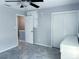 This bedroom has tile flooring, overhead fan and double door closet at 5242 Beach Se Dr, St Petersburg, FL 33705