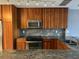 Well-equipped kitchen featuring modern appliances, granite countertops, and ample storage space at 5242 Beach Se Dr, St Petersburg, FL 33705