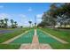 Outdoor shuffleboard court in a well-maintained community setting at 5242 Beach Se Dr, St Petersburg, FL 33705