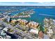 Stunning aerial view of waterfront condos with lush landscaping and beautiful waterways at 5301 Gulf Blvd # B508, St Pete Beach, FL 33706