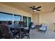 Balcony offering bay views features a dining table and chairs, perfect for enjoying outdoor meals at 5301 Gulf Blvd # B508, St Pete Beach, FL 33706