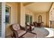 Relaxing balcony with comfortable seating and a dining area at 5301 Gulf Blvd # B508, St Pete Beach, FL 33706