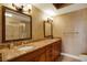 Bathroom features granite countertops, dual sinks, and decorative cabinetry at 5301 Gulf Blvd # B508, St Pete Beach, FL 33706
