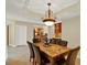 Open dining area with views into the kitchen, plus stylish decor at 5301 Gulf Blvd # B508, St Pete Beach, FL 33706