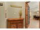 Hallway with decor and a view of the dining room, showing interior design at 5301 Gulf Blvd # B508, St Pete Beach, FL 33706