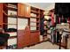 Spacious walk-in closet with custom shelving and ample storage space at 5301 Gulf Blvd # B508, St Pete Beach, FL 33706