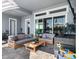 This beautiful patio features comfortable seating, a wooden table, and sliding glass doors to the interior at 5409 Del Coronado Dr, Apollo Beach, FL 33572