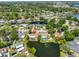 Charming neighborhood with waterfront homes, mature trees, and serene atmosphere in a sought-after location at 5785 Bay Pines Lakes Blvd, St Petersburg, FL 33708