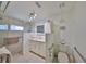 Clean bathroom featuring a tiled walk-in shower and updated vanity at 5785 Bay Pines Lakes Blvd, St Petersburg, FL 33708