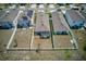 Aerial view of a single Gathering home featuring a screened in patio and fenced yard at 588 Olive Conch St, Ruskin, FL 33570