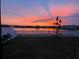 Enjoy stunning sunsets overlooking the lake from this tranquil backyard setting at 588 Olive Conch St, Ruskin, FL 33570