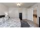 Cozy bedroom with comfortable furnishings, plush carpet, and ample closet space at 588 Olive Conch St, Ruskin, FL 33570
