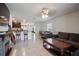 Open-concept living area featuring tile floors and seamlessly connecting to the kitchen at 588 Olive Conch St, Ruskin, FL 33570