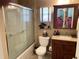 Bathroom featuring a glass shower, vanity, and new lighting at 5920 30Th S Ct, St Petersburg, FL 33712