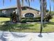 A beautiful entrance sign to Ahali Place with lush greenery and manicured landscaping at 5920 30Th S Ct, St Petersburg, FL 33712