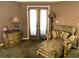 Cozy sitting room with a chaise lounge and french doors, great for relaxation at 5920 30Th S Ct, St Petersburg, FL 33712