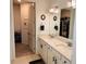 A spacious bathroom features double sinks, modern fixtures, and a walk-in closet at 5981 Shorebird Br, Land O Lakes, FL 34638