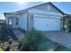 Charming single Gathering home featuring a two car garage and manicured landscaping at 5981 Shorebird Br, Land O Lakes, FL 34638