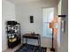Bright home office space with a desk, rug and natural light at 5981 Shorebird Br, Land O Lakes, FL 34638