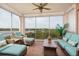 Relaxing balcony features outdoor seating and stunning water views at 7040 Key Haven Rd # 601, Seminole, FL 33777