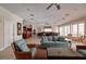 Bright living room featuring comfortable seating, elegant decor, and abundant natural light, perfect for relaxation at 7040 Key Haven Rd # 601, Seminole, FL 33777