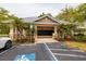 Community mailboxes area with covered access, palm trees, accessible parking and fire hydrant at 7040 Key Haven Rd # 601, Seminole, FL 33777